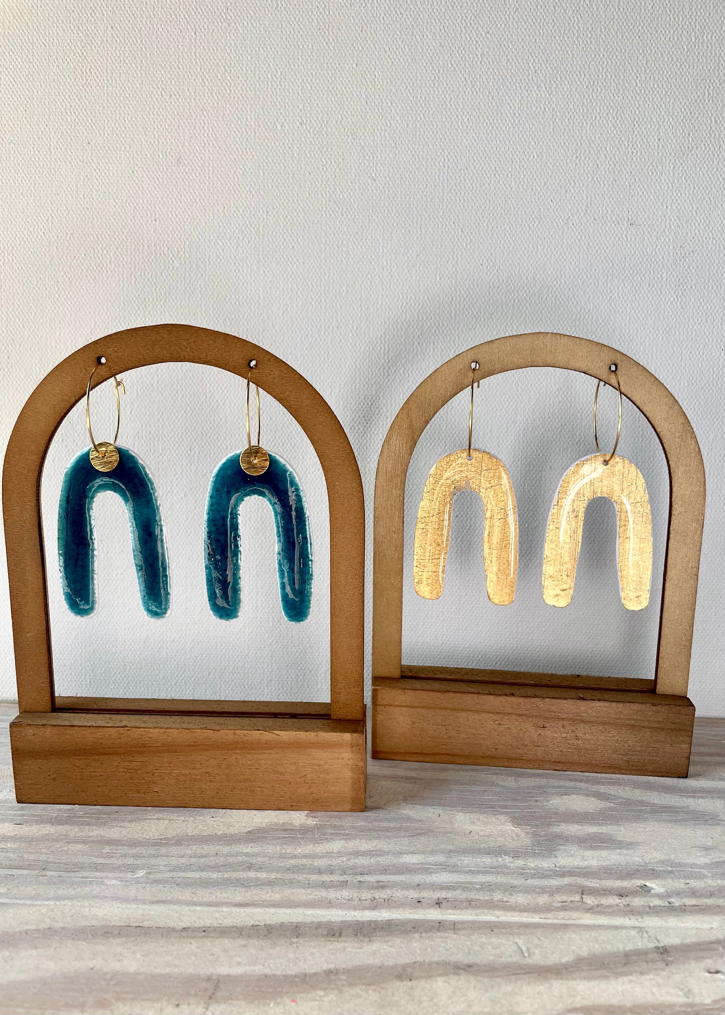 Colored coy arch dangles